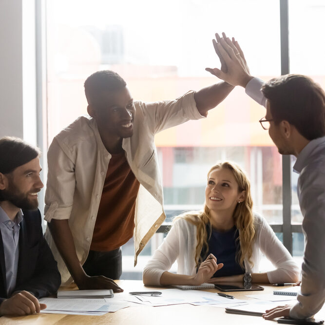 Happy,Young,African,American,Employee,Giving,High,Five,To,Smiling