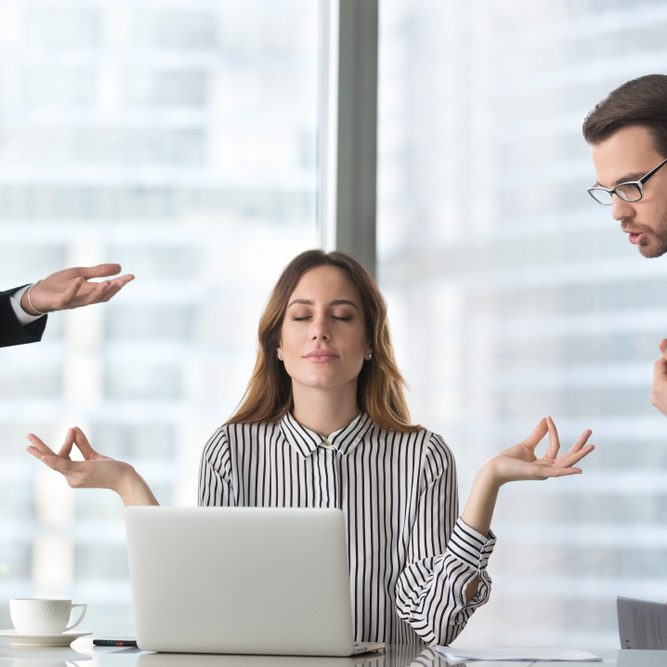 Calm,Female,Worker,Meditate,At,Workplace,Managing,Stress,Not,Paying
