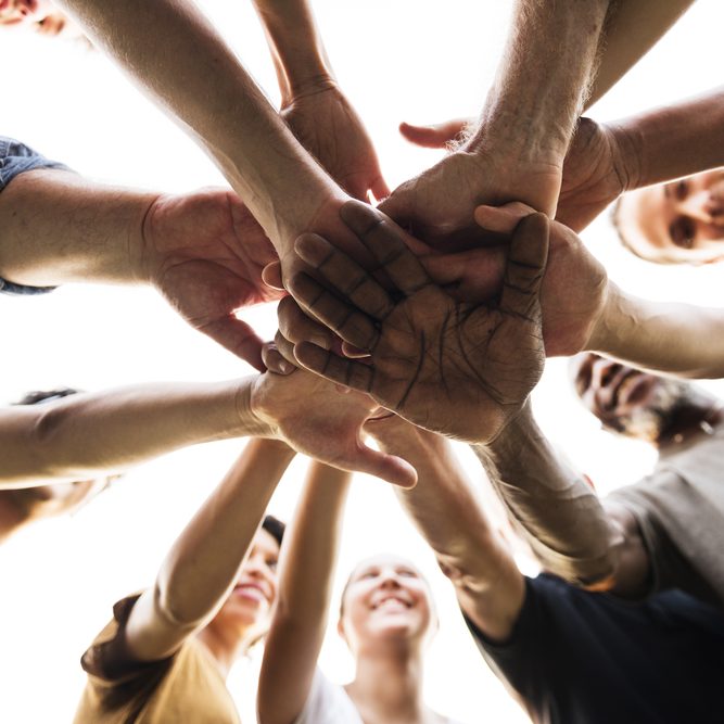 Diverse,Group,Of,People,Hands,Together,Partnership,Teamwork
