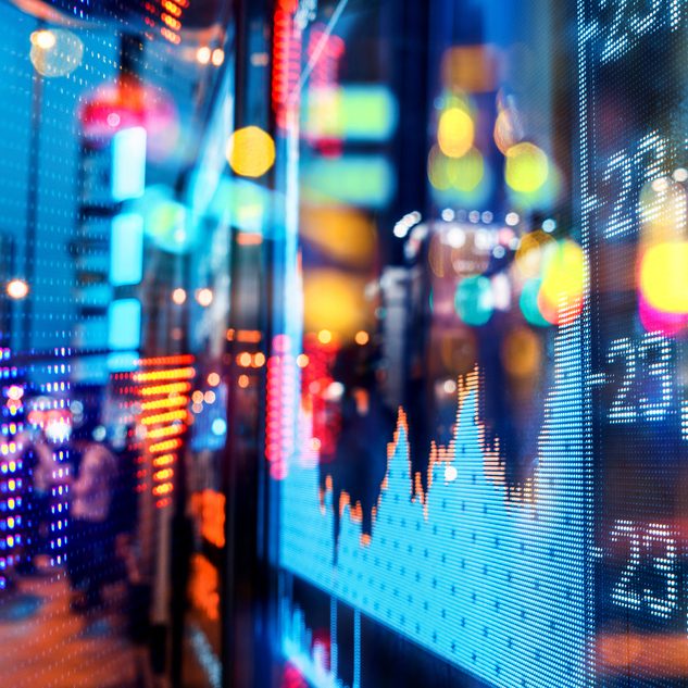 Display,Of,Stock,Market,Quotes,With,City,Scene,Reflect,On