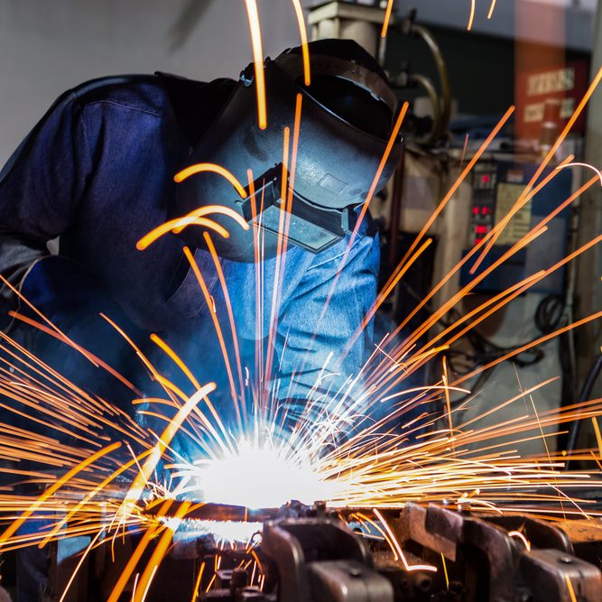 Welder,Is,Welding,Metal,Part,In,Car,Factory